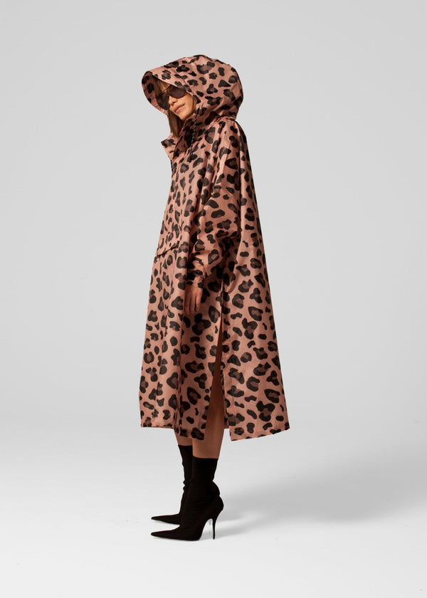 Leopard print hooded coat worn by a person on a white background